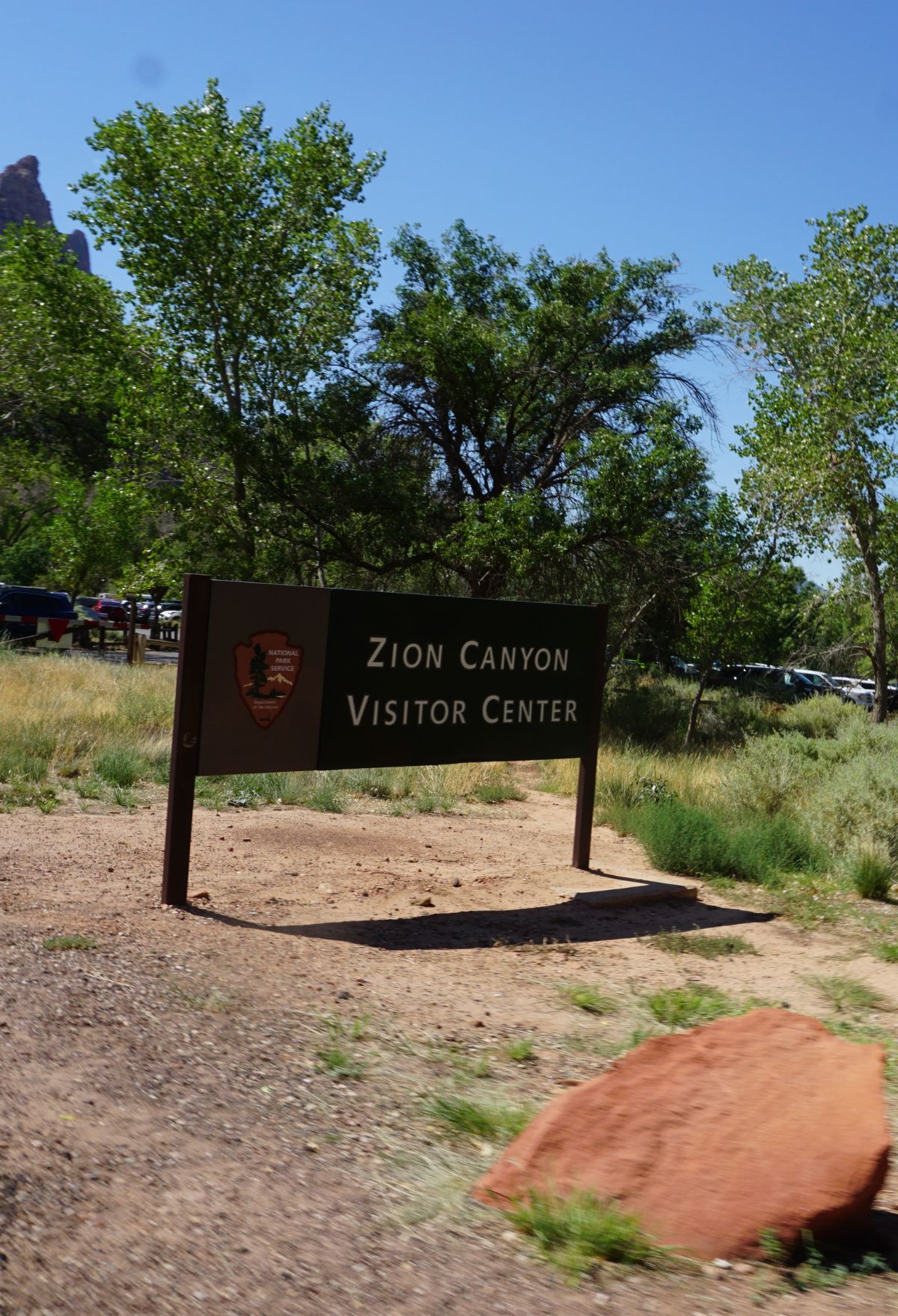 A sign for the Zion Canyon Visitor Center in Zion National Park, Utah.