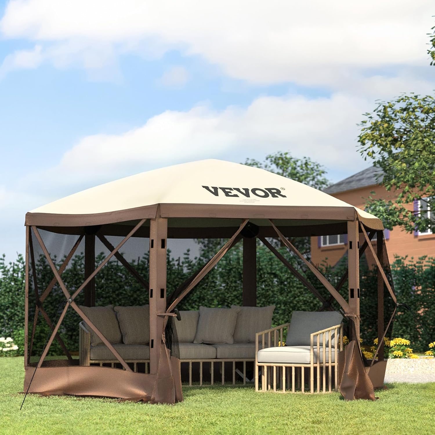 A brown and beige outdoor gazebo with the brand name "VEVOR" on the canopy, covering wooden patio furniture with grey cushions, set on a grassy lawn—one of our favorite products for stylish outdoor living.