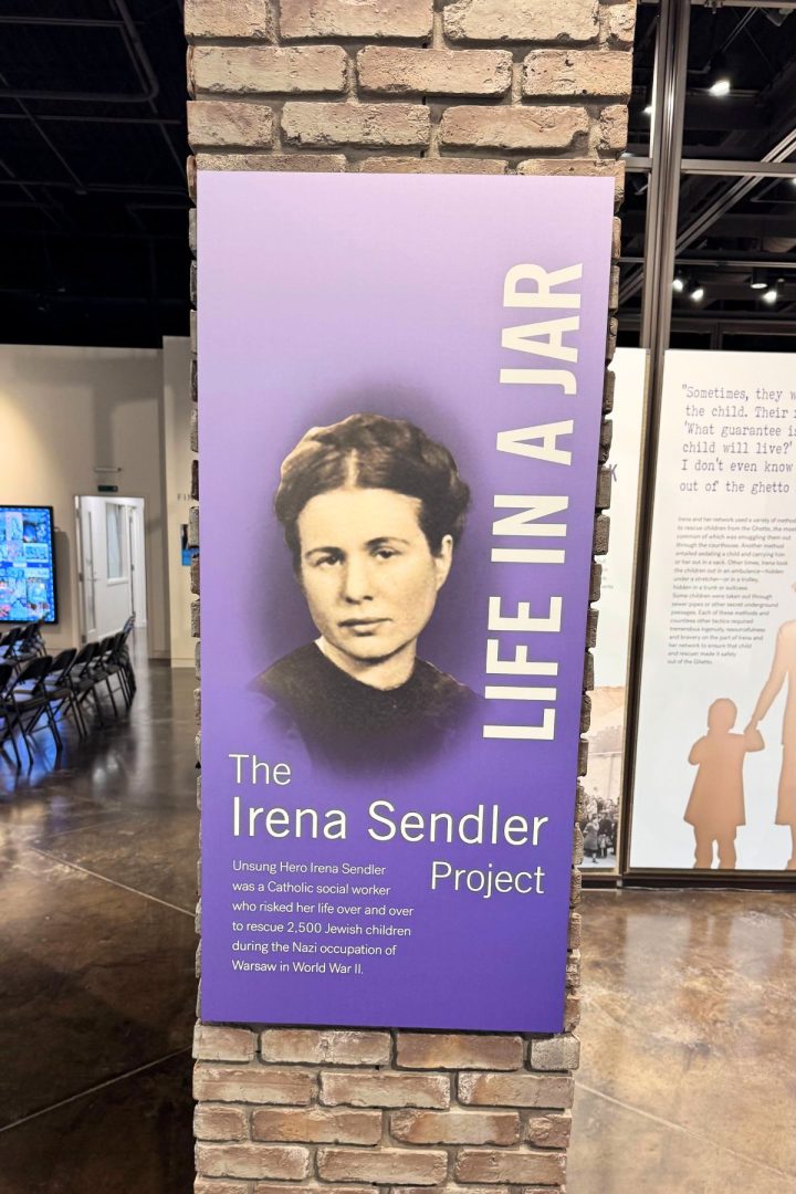 A museum display panel features a portrait of Irena Sendler and text describing her role in rescuing over 2,500 Jewish children from the Warsaw Ghetto during World War II, inspiring visitors from Southeast Kansas and beyond with her courage.