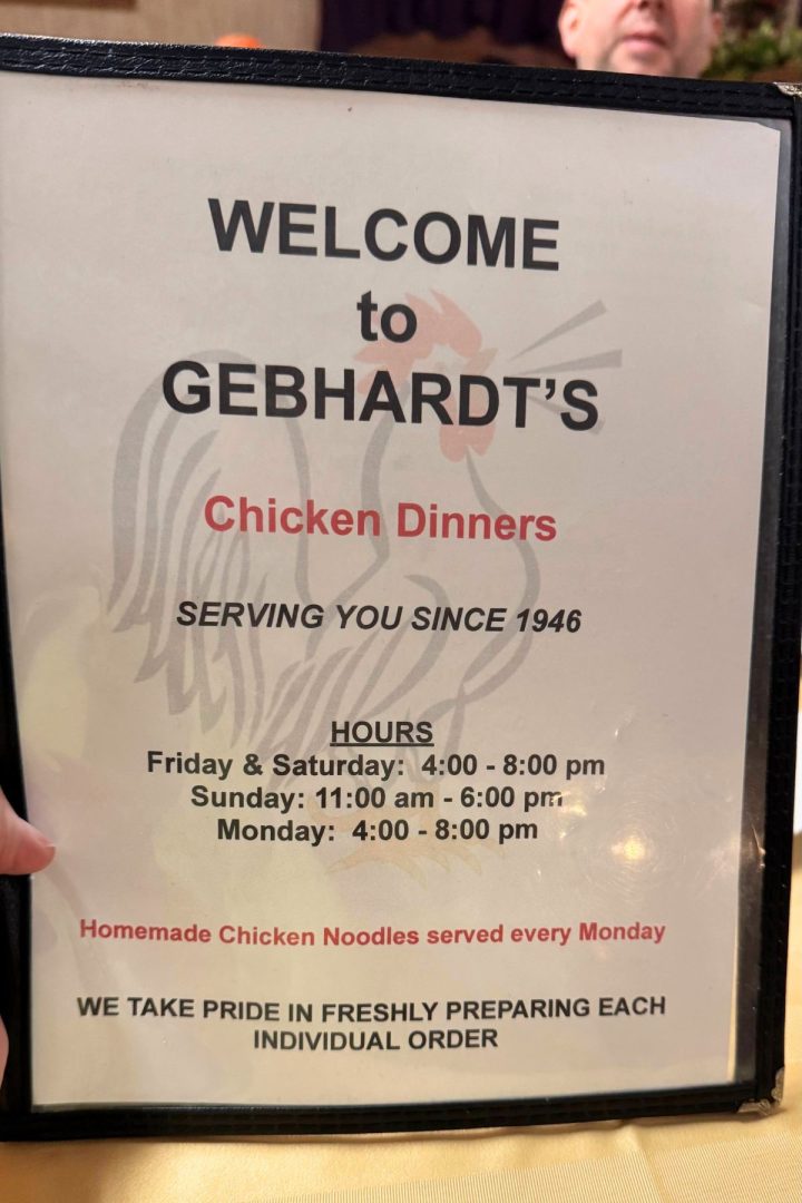 Menu at Gebhardt’s in Southeast Kansas advertising chicken dinners since 1946, with hours listed for Friday to Monday, and a note about homemade chicken noodles served every Monday.